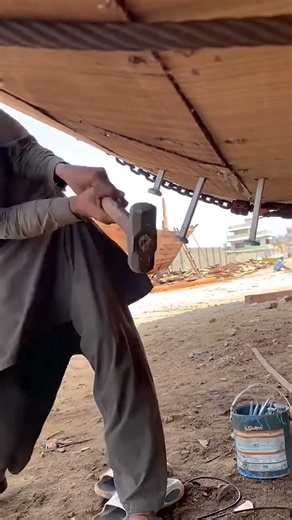 Traditional Wooden Boat Building: Fastening the Hull Planks with Long Boat Nails