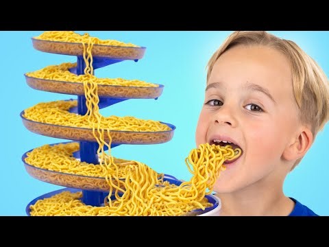 Kids learn teamwork and make rainbow noodles