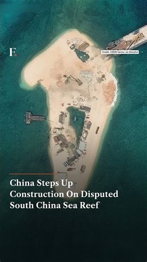 China Steps Up Construction On Disputed South China Sea Reef | N18G