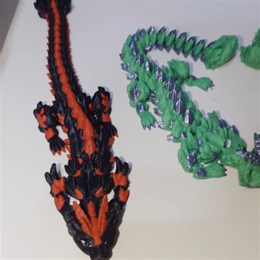 Ryan on Instagram: "Triple the dragons, triple the magic! 🐱🐉🐉🐉 Watch THREE cat dragons being printed at once in epic color schemes! 🔥🌲❄️Fire Dragon (black & red) 🔥 Forest Dragon (green & silver) 🌲 Snow Leopard Dragon (white & brown) ❄️All fully articulated and ready to form your dragon army! Build your collection with these mythical beauties! ✨🛒 Available now at the link in bio! 👉 https://www.initiativedesign.shopWhich one is YOUR favorite? Comment below! 👇 1️⃣2️⃣3️⃣#3DPrinting #CatDr