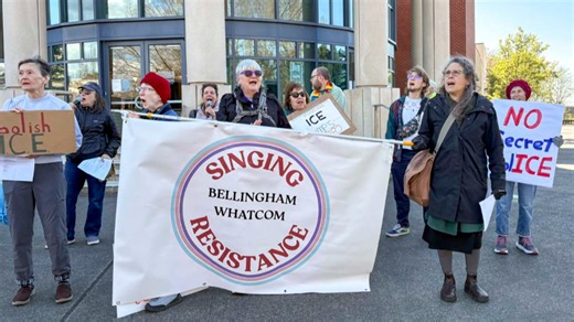 Singing Resistance protests outside Whatcom County Courthouse