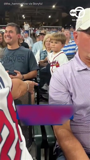 Dodgers fan refuses to give foul ball to young Braves fan