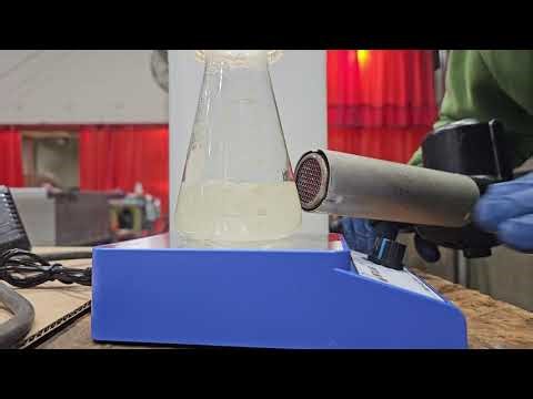 Nitric acid and ammonium bifluoride (hydrofluric acid) titration.