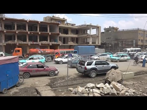 Owners forced to tear down homes and businesses as Afghan capital overhauls roads