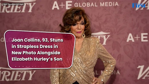Joan Collins, 93, Stuns in Strapless Dress in New Photo Alongside Elizabeth Hurley’s Son