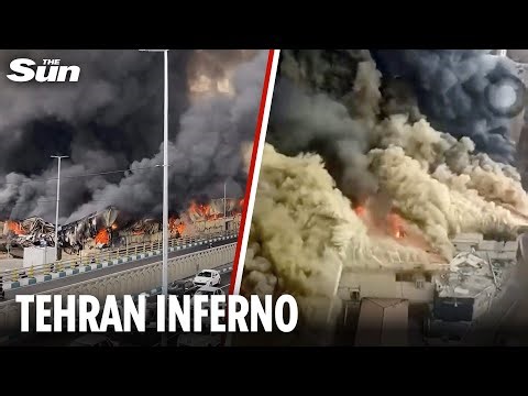 Heavy black smoke smothers Iran’s capital as HUGE FIRE destroys Tehran market