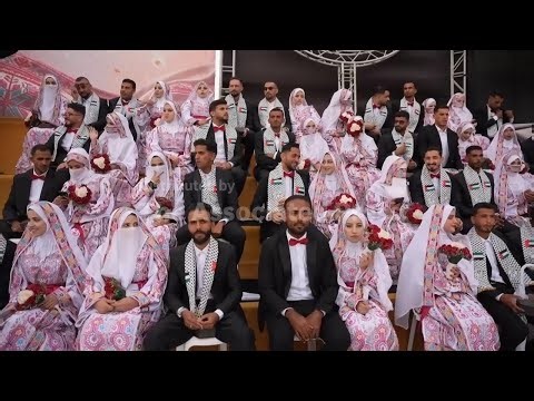 Palestinian couples eye the future as they get married in mass wedding in Gaza Strip