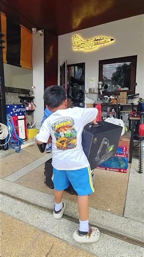 Ten-wheel truck delivering excavators to Opto Toys shop
