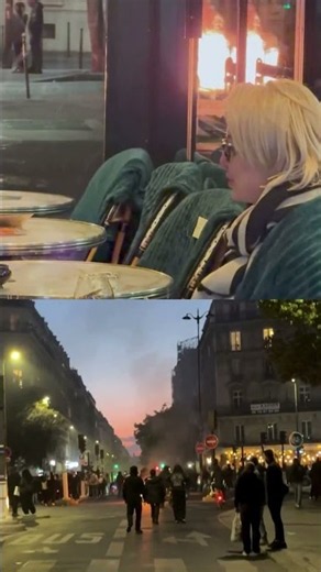Paris In Chaos, But This Couple Keeps Calm And Sips Drinks