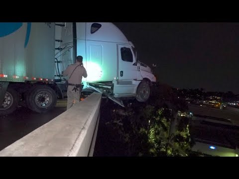 Big Rig Jackknifes on SR-125 South, Left Hanging Over Overpass