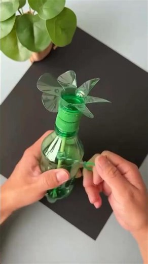 Turn an empty bottle into a spinning wind toy