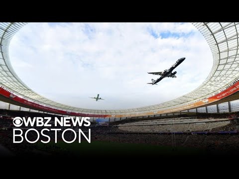 Two passenger jets make jaw-dropping low flyover at South Africa stadium