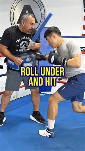 Learn essential boxing defense techniques as The Arena’s Boxing Coach Joe Vargas @joe_hits and fighter Po Song So @posangso break down the proper slip and roll movement for dodging punches. In this boxing training tutorial, discover the U-shaped head movement pattern that keeps fighters safe while maintaining offensive positioning. 🥊 Key Boxing Tips Covered: ✅ Proper slip and roll technique with side-to-side head movement ✅ The #1 mistake fighters make: looking down at the floor while rolling ✅