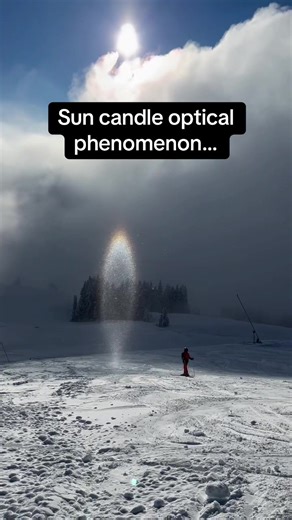A sun candle is a rare atmospheric optical phenomenon where a vertical beam of light appears to rise from the sun. It forms when sunlight reflects off ice crystals in the atmosphere, creating a glowing pillar-like effect. Similar to sun pillars, it’s most commonly seen during sunrise or sunset, when the sun sits low on the horizon. Because of how specific the conditions must be, sightings like this are especially rare. (Lenka Lanci via ViralHog) #RoadTo19M #pubity