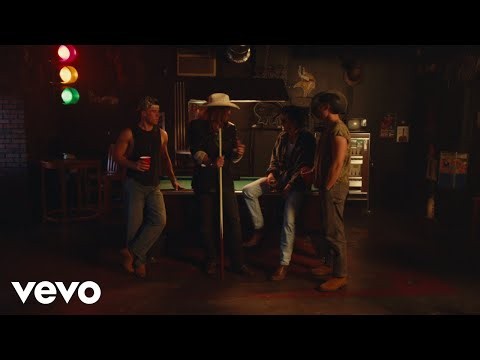 Billy Ray Cyrus Gives DELTONA Frontman Ned Abernathy a Mullet in ‘Party’s In The Back’ Music Video (Exclusive)