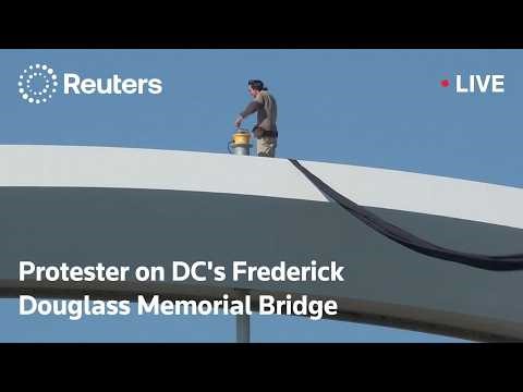 LIVE: Protester on DC's Frederick Douglass Memorial Bridge continues