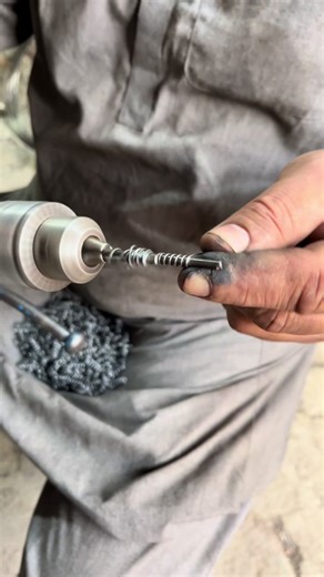 Making a small perfect spring using hand drill #trending #diy #creatorsearchinsight #viralvideos