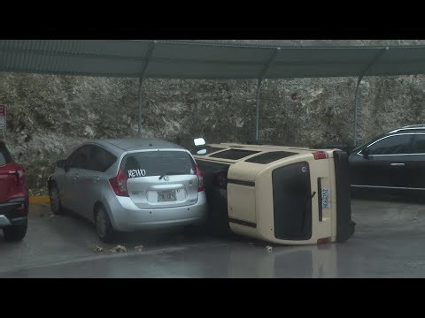 Flipped car, uprooted trees after Super Typhoon Bavi lashes Guam | AFP