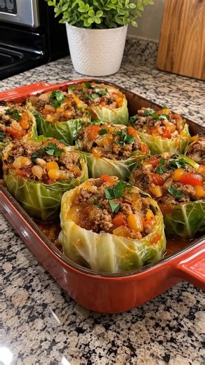 Stuffed Cabbage Rolls … Some recipes are too good to forget ✨ Comment “Yumm” and check the link in bio 📘 #recipeideas #foodtiktok #easymeals #comfortfood #recipes
