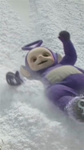 Tinky Winky's winter adventures: 100% joy, 0% coordination 🤪💜 Video: Tinky Winky, the purple Teletubby, slips and slides down a snowy hill. | Teletubbies