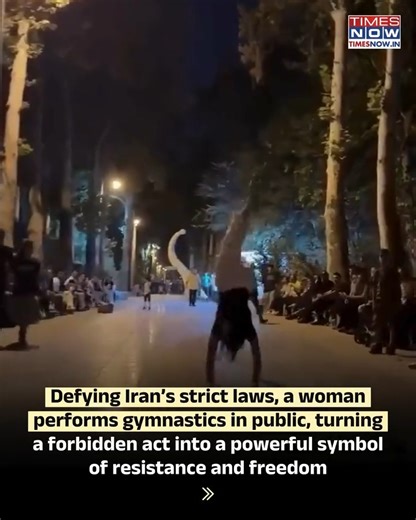 A woman performs gymnastics in public in Iran, defying strict morality laws that control women’s presence and expression in public spaces. In a country where such acts can invite arrest or harassment, the moment has emerged as a quiet yet powerful statement against state control and for personal freedom, resonating far beyond Iran’s borders. 🎥DahliaKurtz #TimesNow #TimesNowNews | TIMES NOW