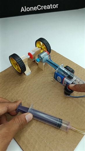 Transferring Power to Wheels Using a Syringe #dcmotor