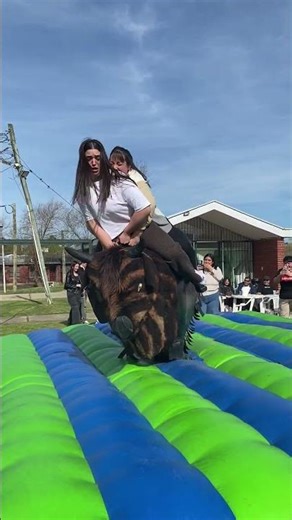 Mechanical Bull Snaps Off Base and Falls While Two Women Ride It