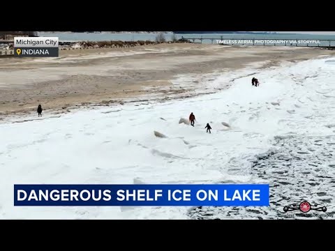 VIDEO: People seen slipping on dangerous ice shelf on Lake Michigan shore