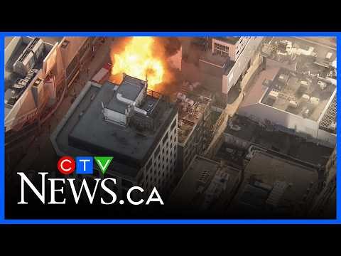 Crews knock down fire on roof of downtown Toronto building