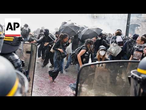 Riot police fire tear gas as more than 250,000 rally in France over school funding