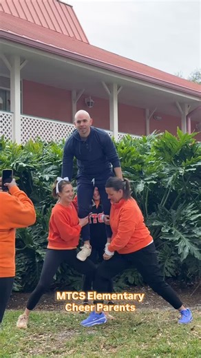 Dara Payne on Instagram: "You think your parents are just cheering from the sidelines… but we secretly learned a whole routine to surprise you at DISNEY NATIONALS 👀😭✨ MTCS Elementary Cheer made it to Nationals at Disney World and the parents decided to step in with a surprise of our own 💙📣 Behind the scenes, secret rehearsals, and LOTS of laughs all led up to this unforgettable moment. These kids inspire us every single day and we couldn’t be more proud! Wait for the reveal… 🔥💫 #MTCSCheer 
