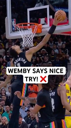 Wemby blocks Luka off of the back board