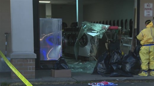 Woman killed after cars crash into Newark laundromat: officials