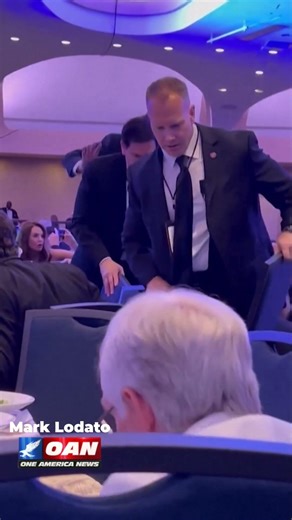 President Trump and other cabinet members being escorted out of the room following the shooting