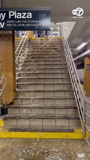 Heavy rain turns NYC subway station stairs in waterfall