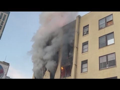 Crews respond to 3-alarm fire at apartment building in downtown Oakland