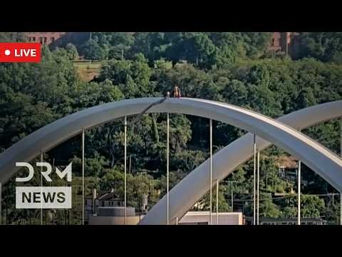 LIVE: Tense Scene in DC as Person Climbs Major Bridge in Barricade Situation | AC1N