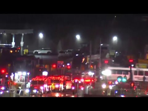 2 dead after plane crashes into truck at LaGuardia Airport