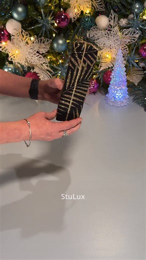 Stu Lux on Instagram: "☃️🎵❄️ PART 2/3 Gift Wrapping Idea with a TABLE RUNNER 💫❄️🎁 More idea with this same table runner in my step-by-step tutorial video 🎊 👉 COMMENT ‘SLOW’ if you need a STEP-BY-STEP tutorial for this wrapping technique 🎥 Images Captured and Edited by @stulux_ 🎶 Music in this video is licensed through Epidemic Sound #christmas #christmascountdown #wrappinghacks #284stulux"