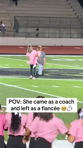 Coach Proposal at Football Game: Cheerleader Coach Becomes Fiancée