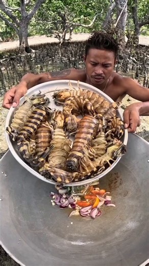 Those are mantis shrimp which are actually really delicate and tasty, and the chef is a monster to cook them alive.