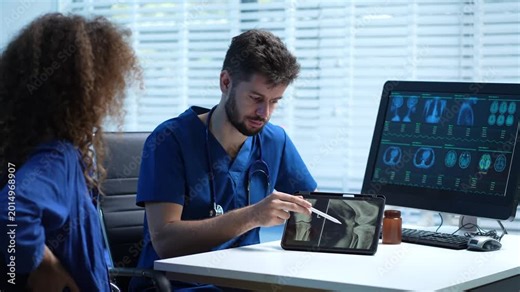 Neurologist explaining brain CT scan results to patient in clinic. Healthcare, radiology, diagnosis