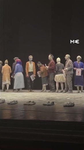 Teatro Bellini cast holds “Free Palestine” banner on stage