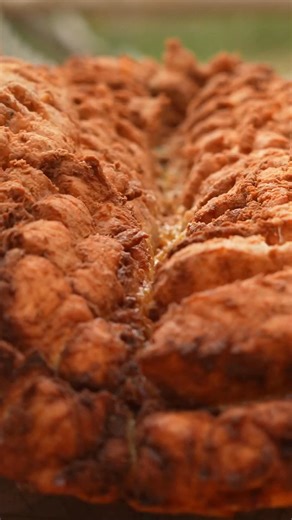 Tender meat, sizzling with spices over open flame, topped with veggies and cheese. A perfect outdoor meal experience. #OutdoorCooking #GrilledMeat #CampfireCuisine #Cooking | Wilderness Grill