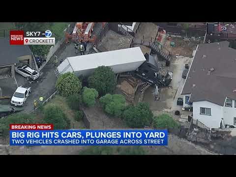 Big rig loses control, crashes through fence, nearly hits Bay Area home