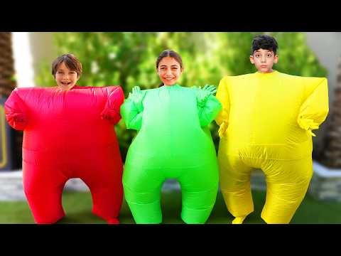 Jason Plays Tag with Friends in Inflatable Costume
