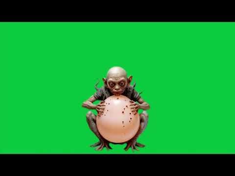The alien and the dinosaur that hatches from the egg 4k green screen VFX