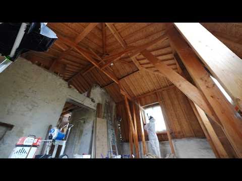 Treating, sanding and varnishing the attic structure for insulation.