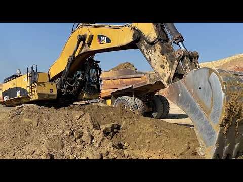 Caterpillar 385C Excavator Loading Caterpillar Dumpers - Interkat SA