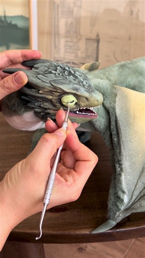 Vhagar awakens 👁️ Working on this dragon wasn’t easy as I decide to turn the biggest, scariest dragon in Westeros into something you want to hug 🧸 🐉 . . . . #gameofthrones #houseofthedragon #dragontoy #scuplture #creepycute